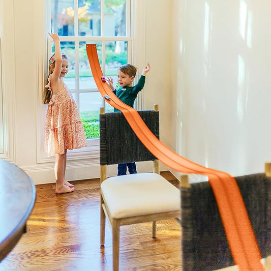 FlexTrack 5000 Flexible Race Car Track for Kids Toy with Suction Cups Compatible with Hot Wheels and Diecast 1/64th Cars and More 15 Feet Long Rolls Up Portable Racetrack (Blazing Orange) Nirvana Guru