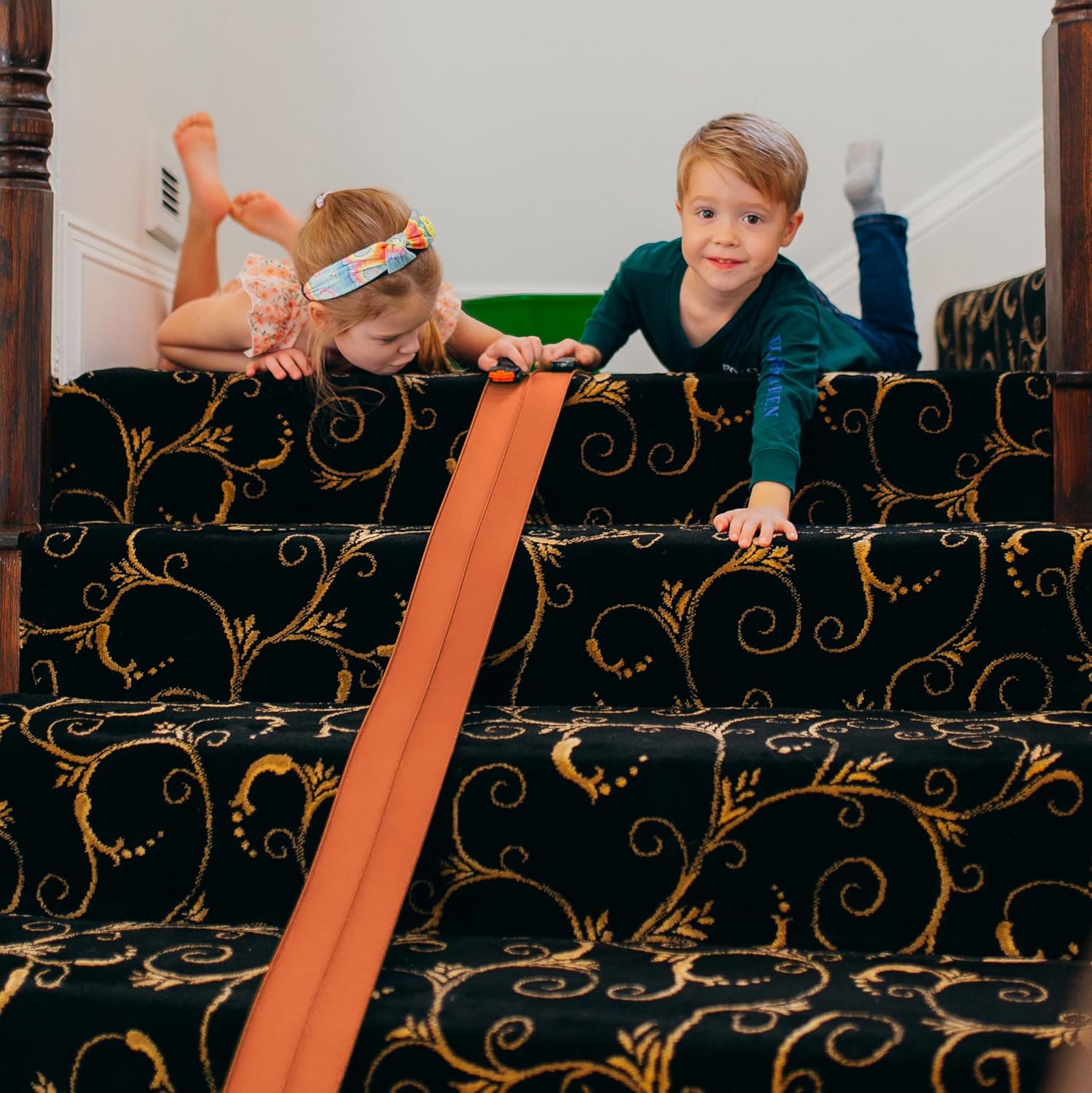 FlexTrack 5000 Flexible Race Car Track for Kids Toy with Suction Cups Compatible with Hot Wheels and Diecast 1/64th Cars and More 15 Feet Long Rolls Up Portable Racetrack (Blazing Orange) Nirvana Guru