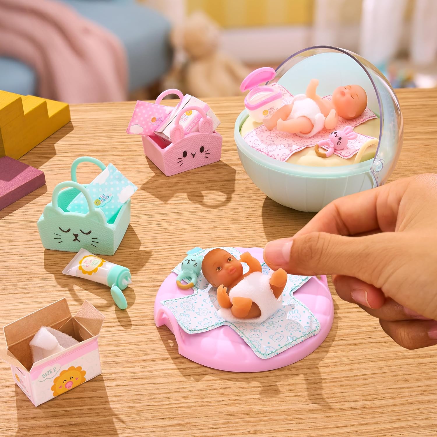 MGA's Miniverse Make It Mini Real Baby Nurture - Blind Packaging - Baby Care Themed Mini Collectibles - 8 Styles Including Rare Twins - Collectors, 8+ MINIVERSE